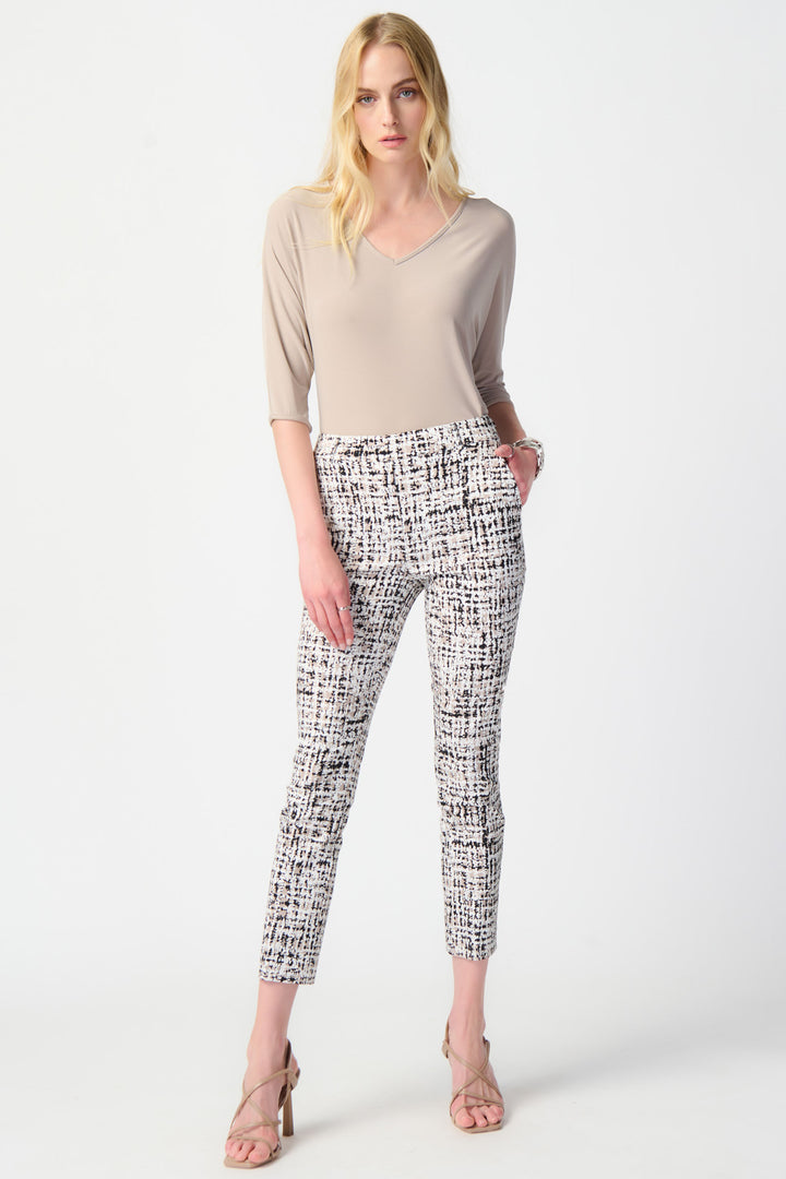 Sleek and modern, these pants feature a fitted, slim fit and an elastic waist for both style and comfort.