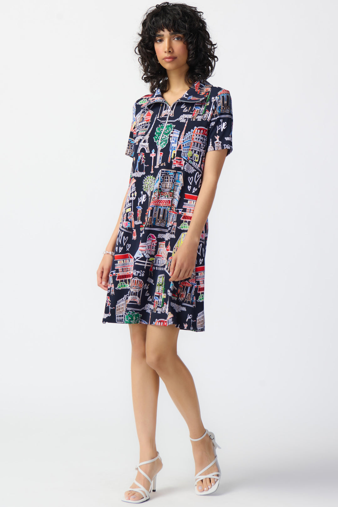 Featuring a zippered neckline and a beautiful Parisian scene, this short dress is the perfect travel companion!