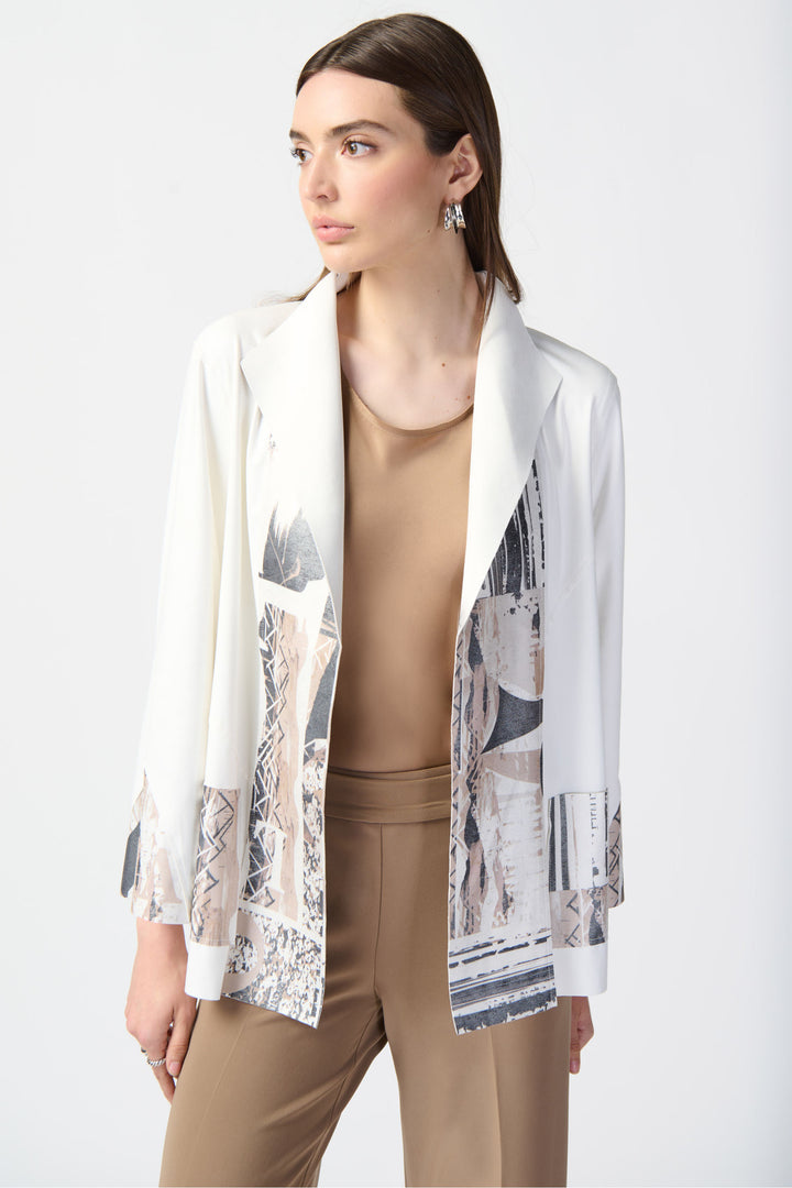 Lift your wardrobe with our Suede Jacket featuring a sleek open style, broad collar and abstract patchwork print. 