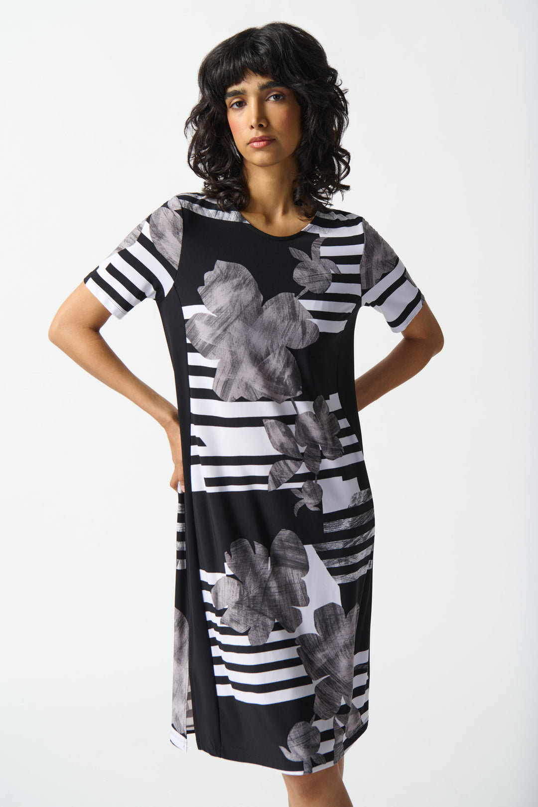 JOSEPH RIBKOFF Spring 2024 Its elegant yet casual design features a playful striped floral pattern and a below the knee length with side slit cuts at the hem.