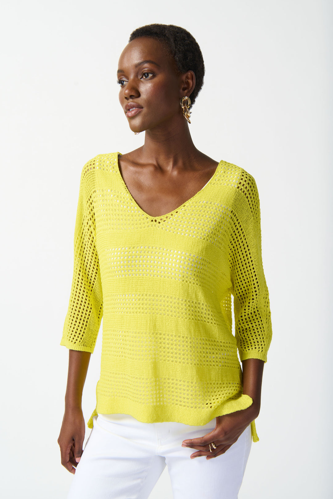 Soft cut V-neck and open stitch design create an artistic pattern, while 3/4 length dolman sleeves keep it light and comfy.