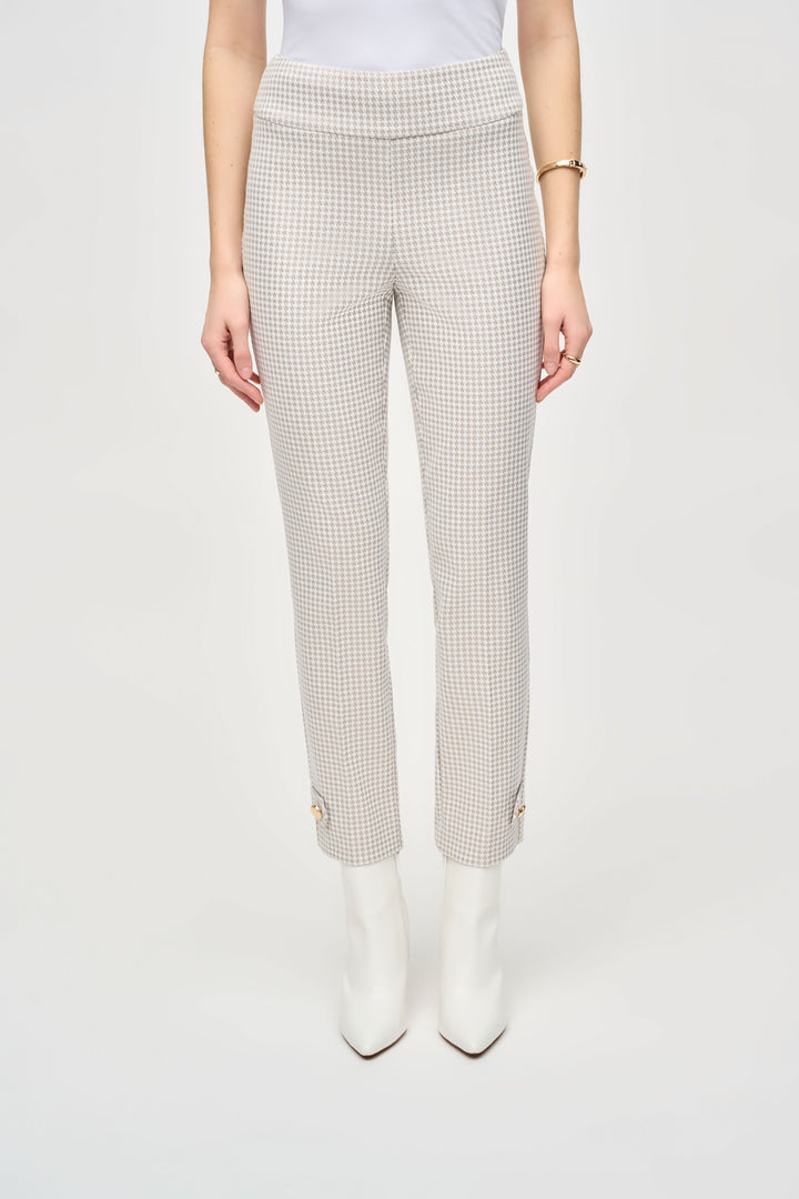 Joseph Ribkoff Fall 2024 The high-rise fit and slip on waist provide both comfort and sophistication. The light yet distinct houndstooth pattern adds a touch of luxury, while the classy button hem detail completes the look.