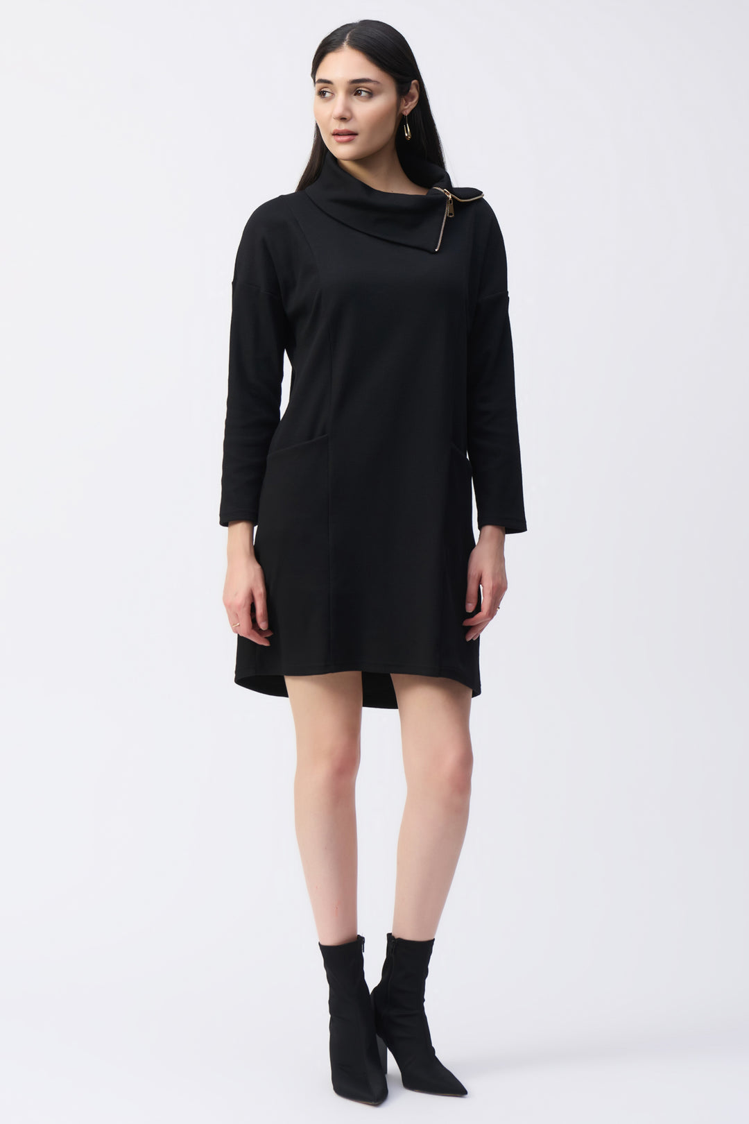 Joseph Ribkoff Fall 2024  The mini pencil skirt style and long straight sleeves offer a sleek look, while the super soft fabric ensures all-day wear. With its zipped cowl neck, you can create multiple ways to wear this dress. 