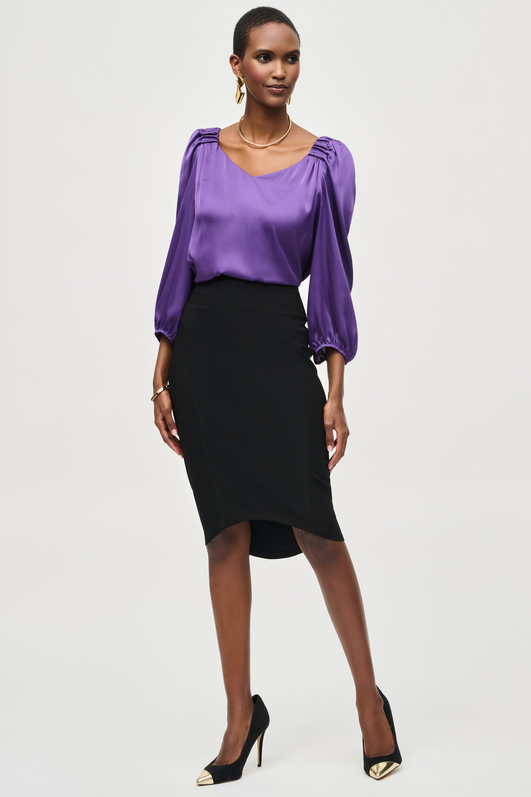 Joseph Ribkoff Fall 2024 With a sleek design and high rise waist, the Hi Lo Pencil Skirt is perfect for semi-formal occasions. Its to the knee length and simple design pattern add a touch of elegance. 