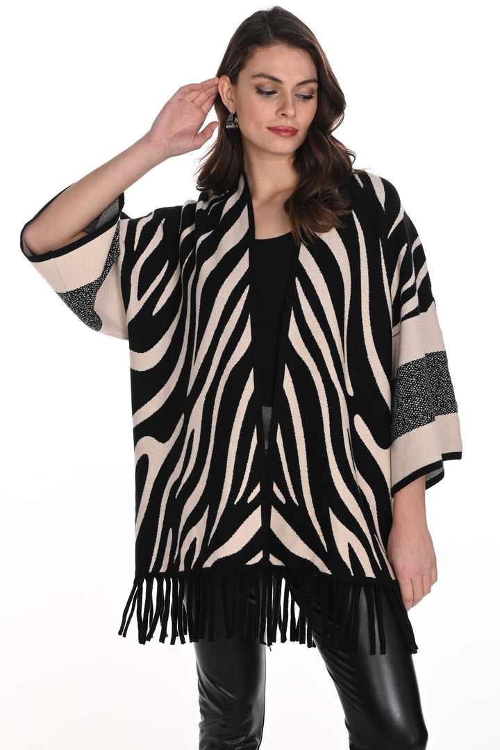 Frank Lyman Fall 2024  This sleek tiger print cardi is perfect for throwing on for a night out. The neat fringe hem details add a touch of flair to any outfit! 