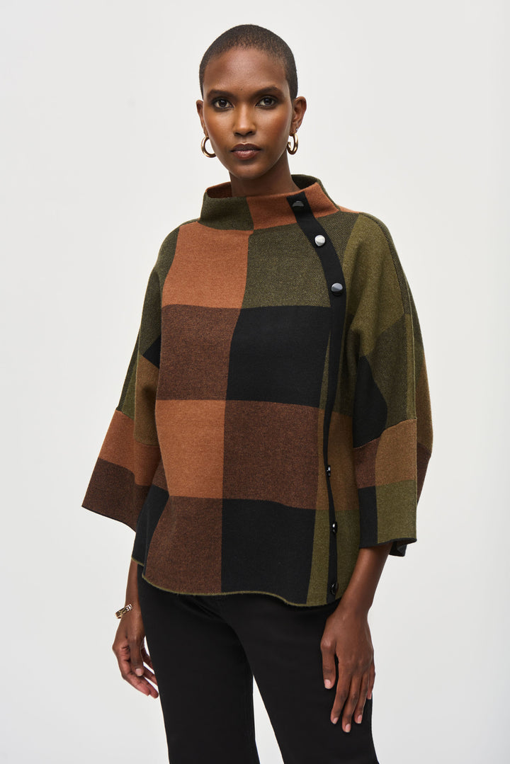 Joseph Ribkoff Fall 2024  Its trendy knit design features a classic plaid print, a mock neck and a front zipper detail. 