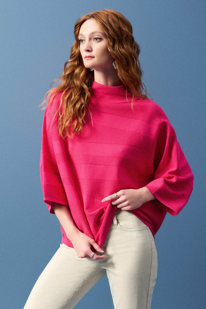 Joseph Ribkoff Spring 2025 
 The 3/4 length loose sleeves add a touch of understated elegance, while the contrast matte and shine stripe pattern elevates the look. 