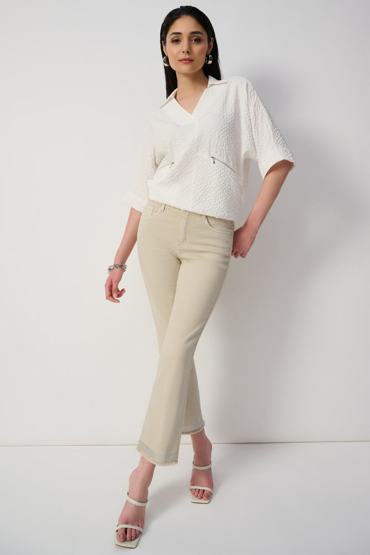 Joseph Ribkoff Fall 2024 They are a classic straight fit. The bling frayed hems are what make these jeans standout from the crowd!