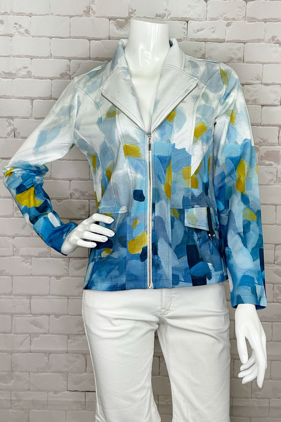 Dolcezza Spring 2024 Perfect for a casual but very elegant look, the Blue Dreams Zip Blazer from our latest spring collection features a unique all-over abstract blue print and a more fitted standard style.