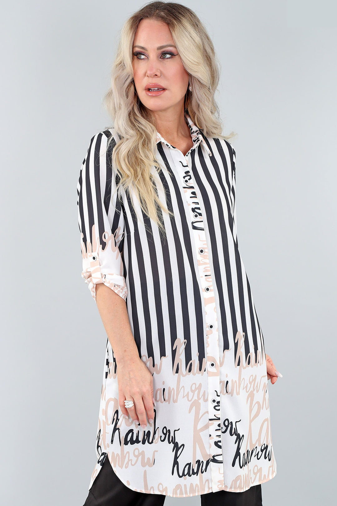 Crafted from airy faille fabric, this top boasts 3/4 length rolled sleeves and a neat letter print. 