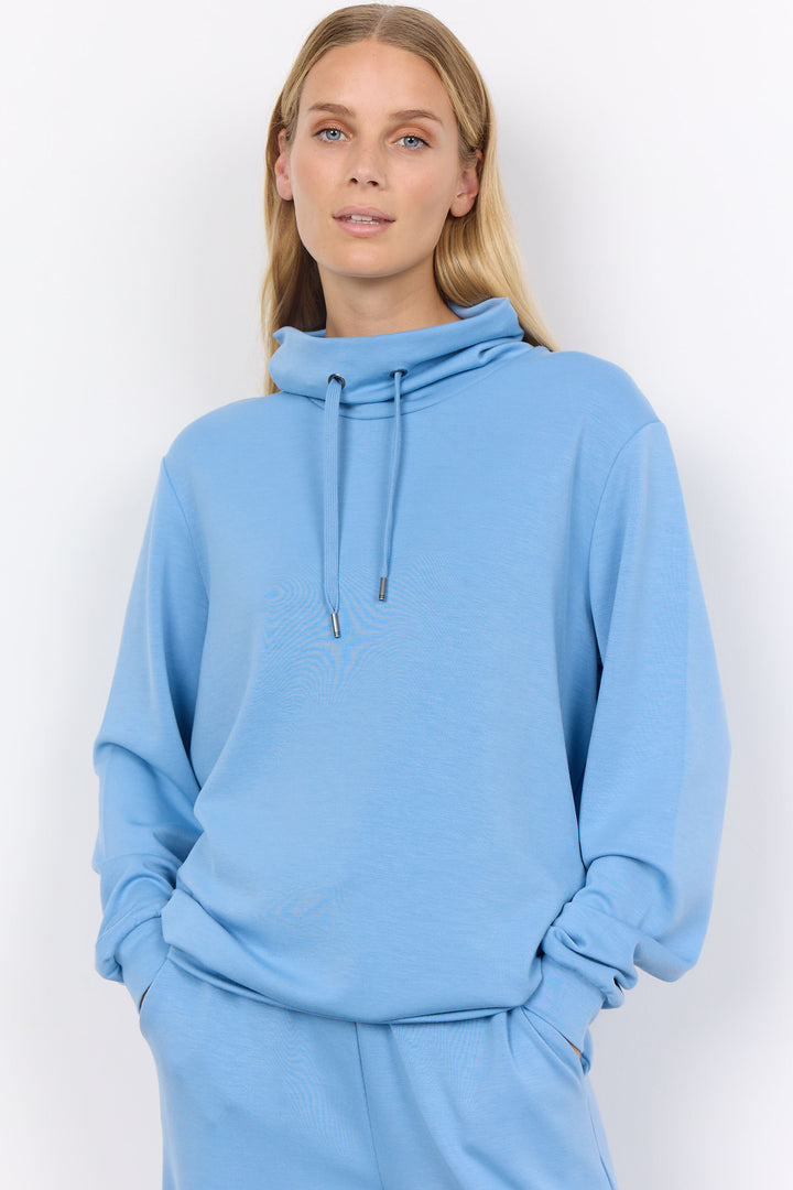 Embrace the classic sweatshirt style with our Drawstring Neck Top!