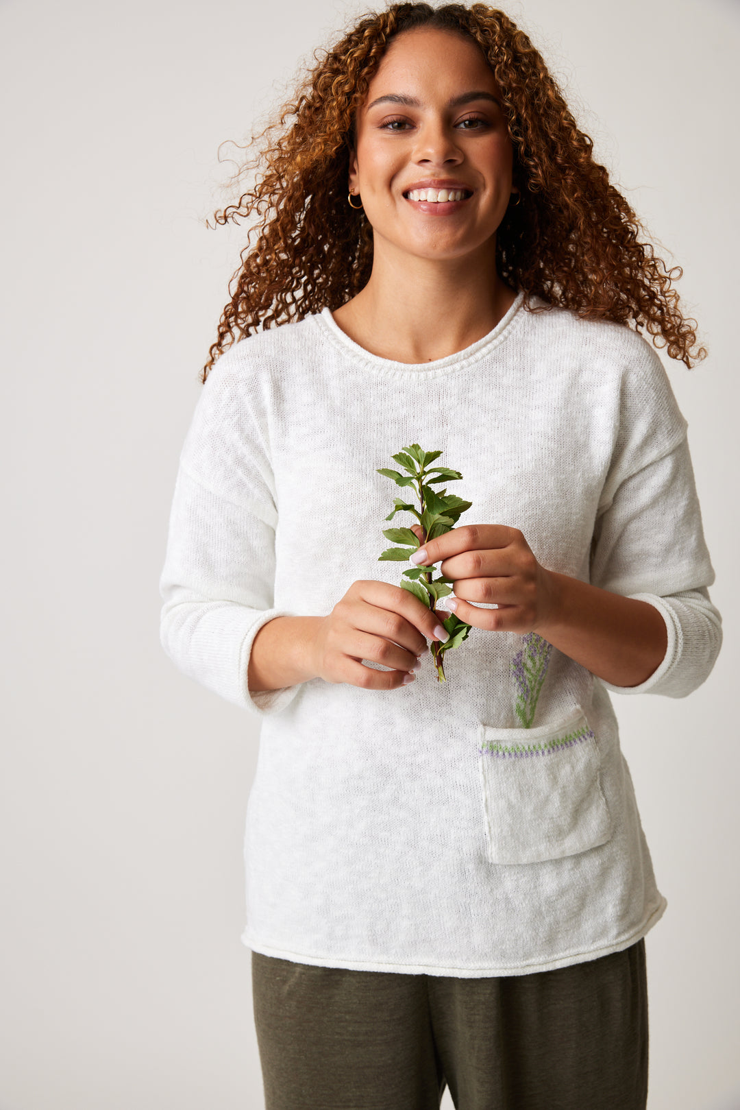 Made from light sweater knit fabric, this top is both cozy and stylish. 