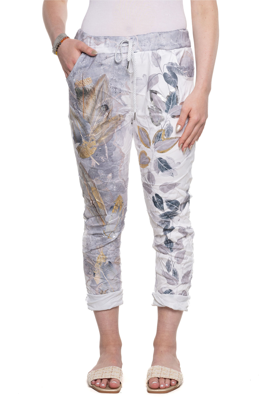 Etern Elle Summer 2024  Made with a blend of viscose, nylon, and elastane, these joggers feature a drawstring waist, cuffed hems and side and back pockets. 