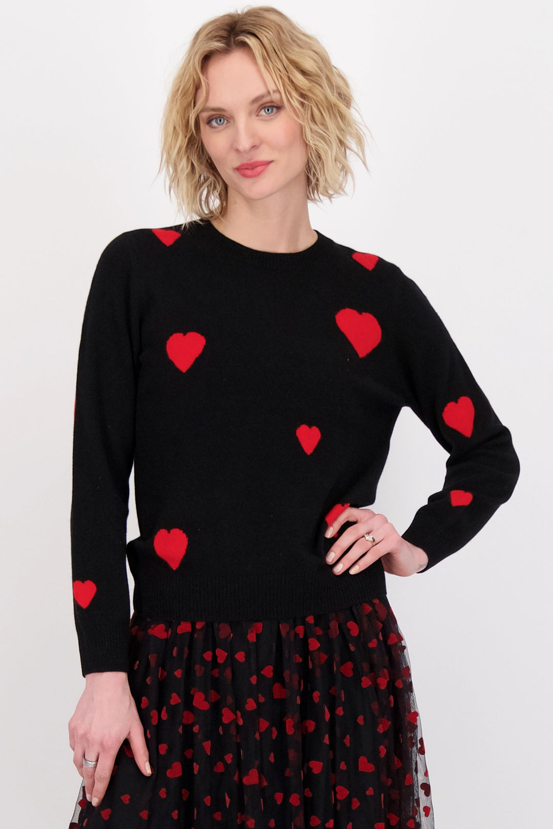 This classic round neck top has full length sleeves and features a beautiful hearts pattern on the front and sides.