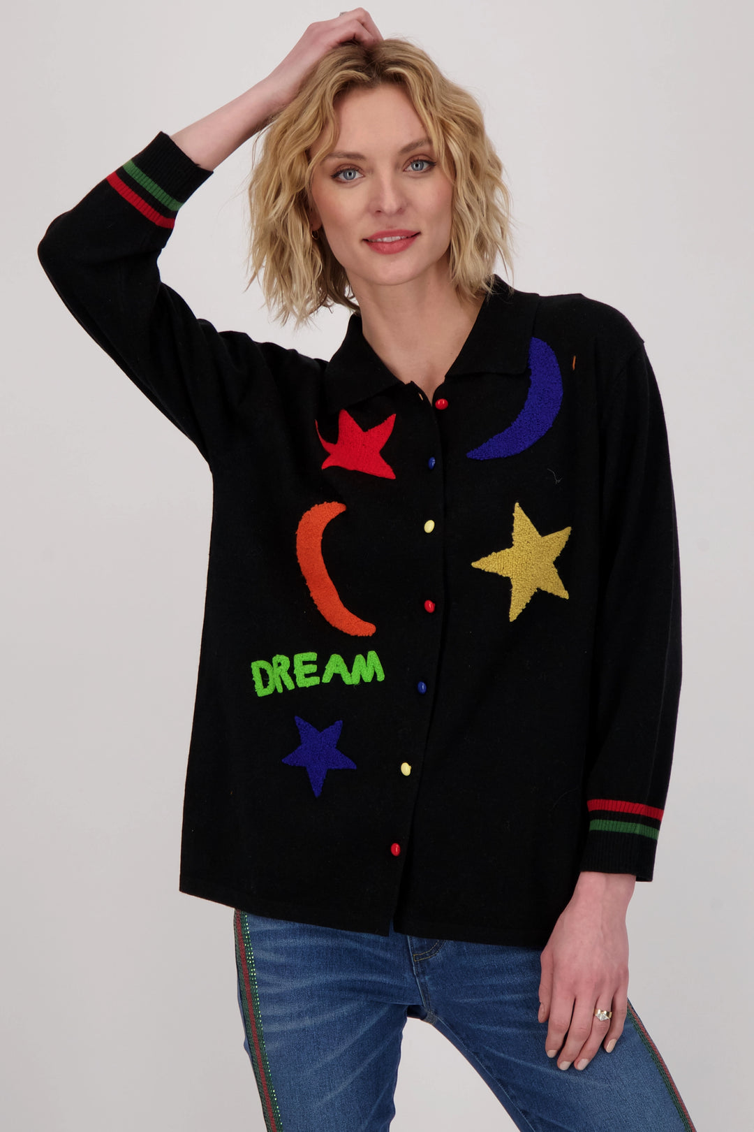 Featuring a standout stars and crescent moon pattern, this light sweater will be sure to make you shine!
