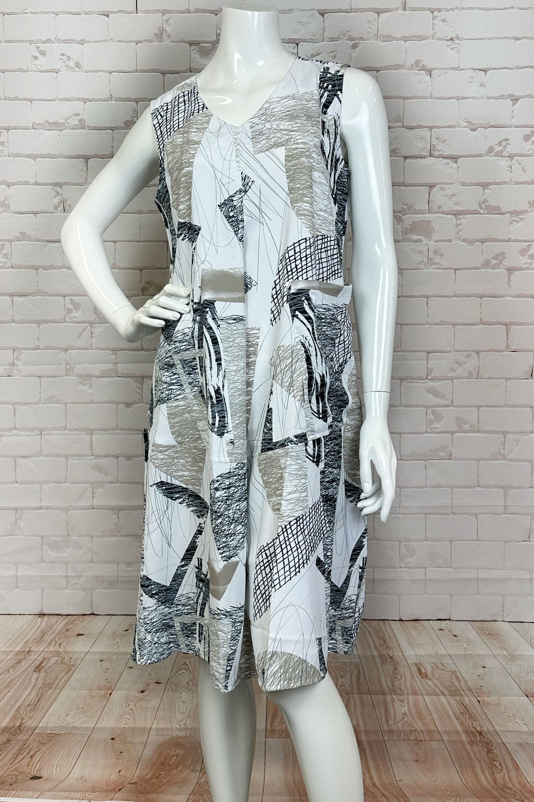 Ever Sassy Spring 2024 Featuring a sleeveless style, v-neckline and a comfortable knee-length, this dress is perfect for any sunny occasion. 