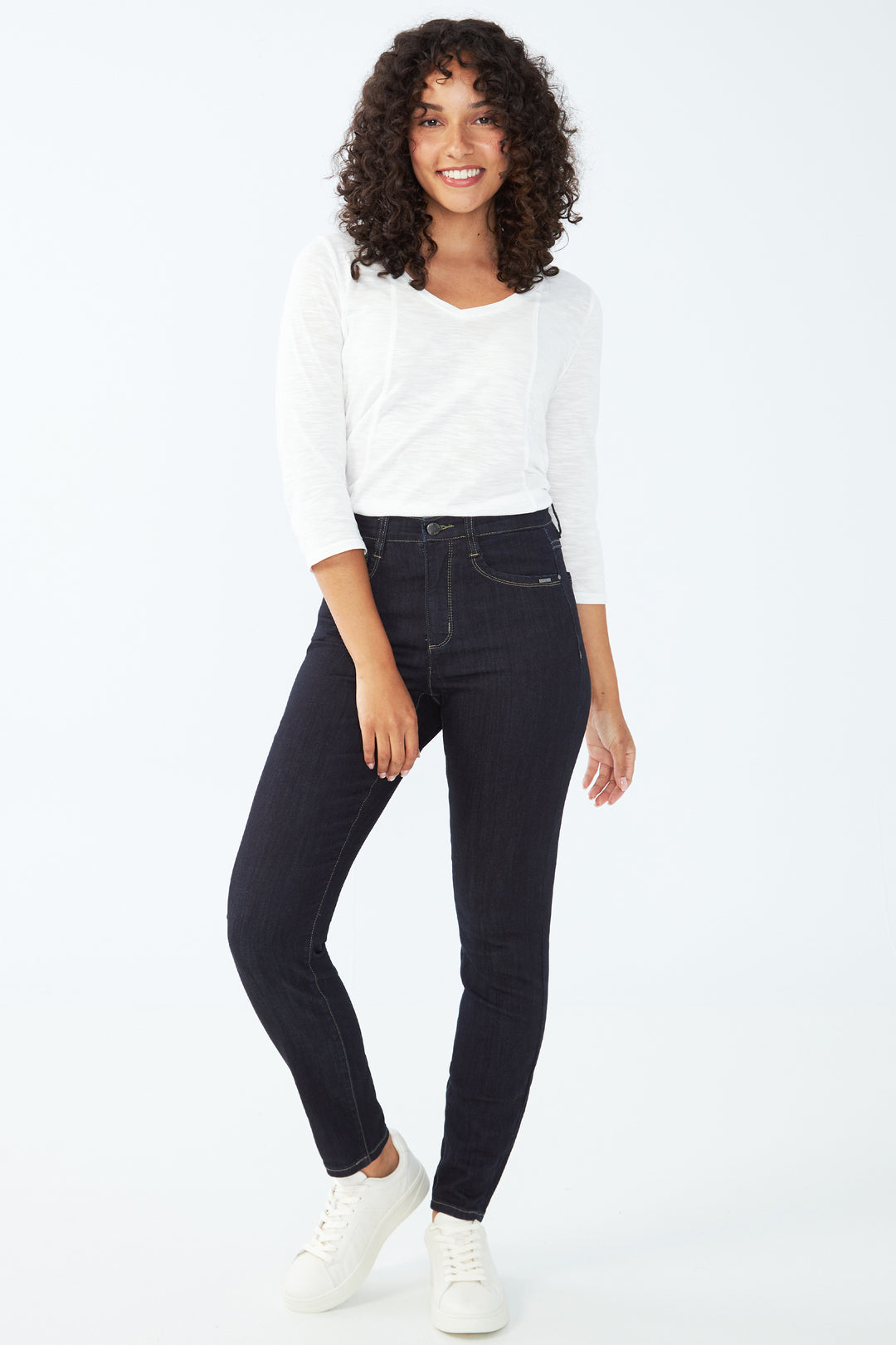 Featuring COOLMAX  fabric, this high-rise jean offers a slim and flattering fit with a five-pocket design. 