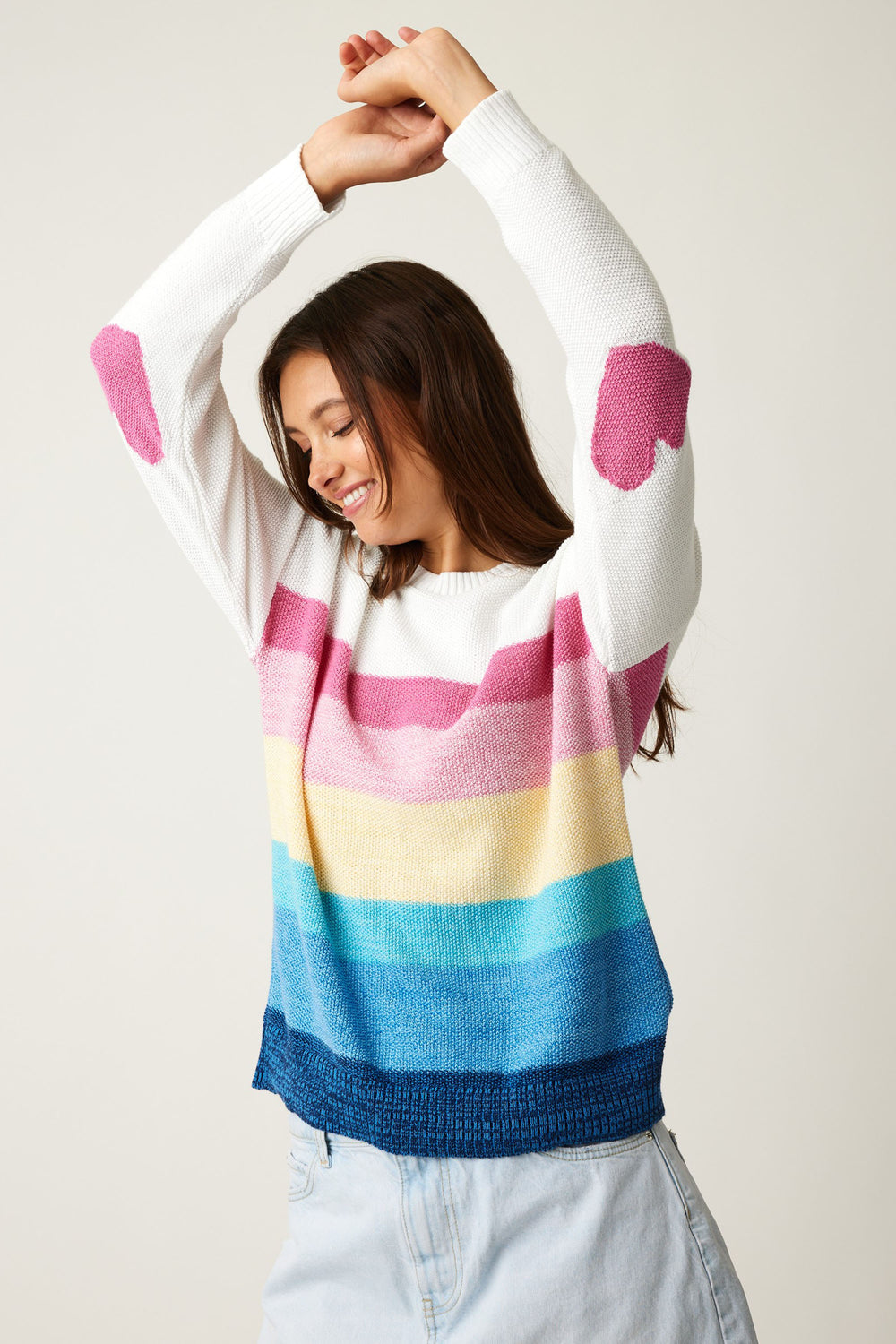 Cotton Country Spring 2024 With a crew neckline and adorable heart detail on the back of the sleeves, this colorful and bold block stripe design pattern adds a unique touch to any outfit. 