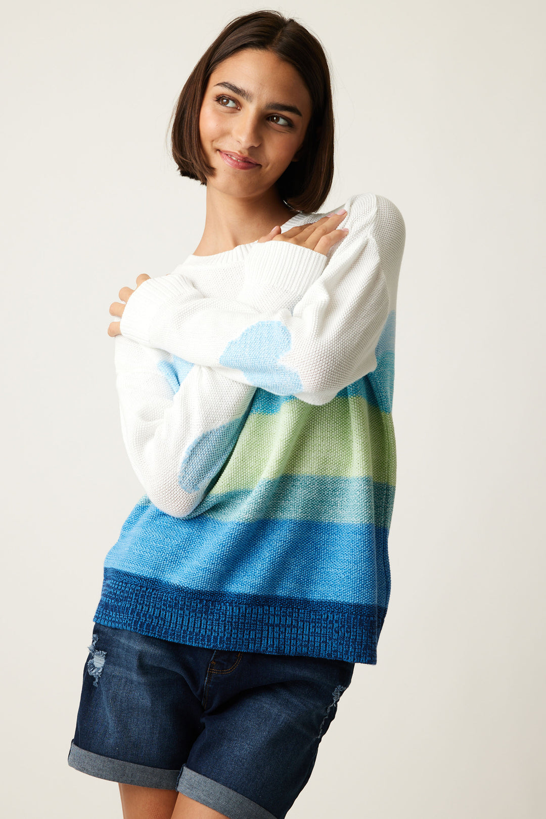 Cotton Country Spring 2024 With a crew neckline and adorable heart detail on the back of the sleeves, this colorful and bold block stripe design pattern adds a unique touch to any outfit.
