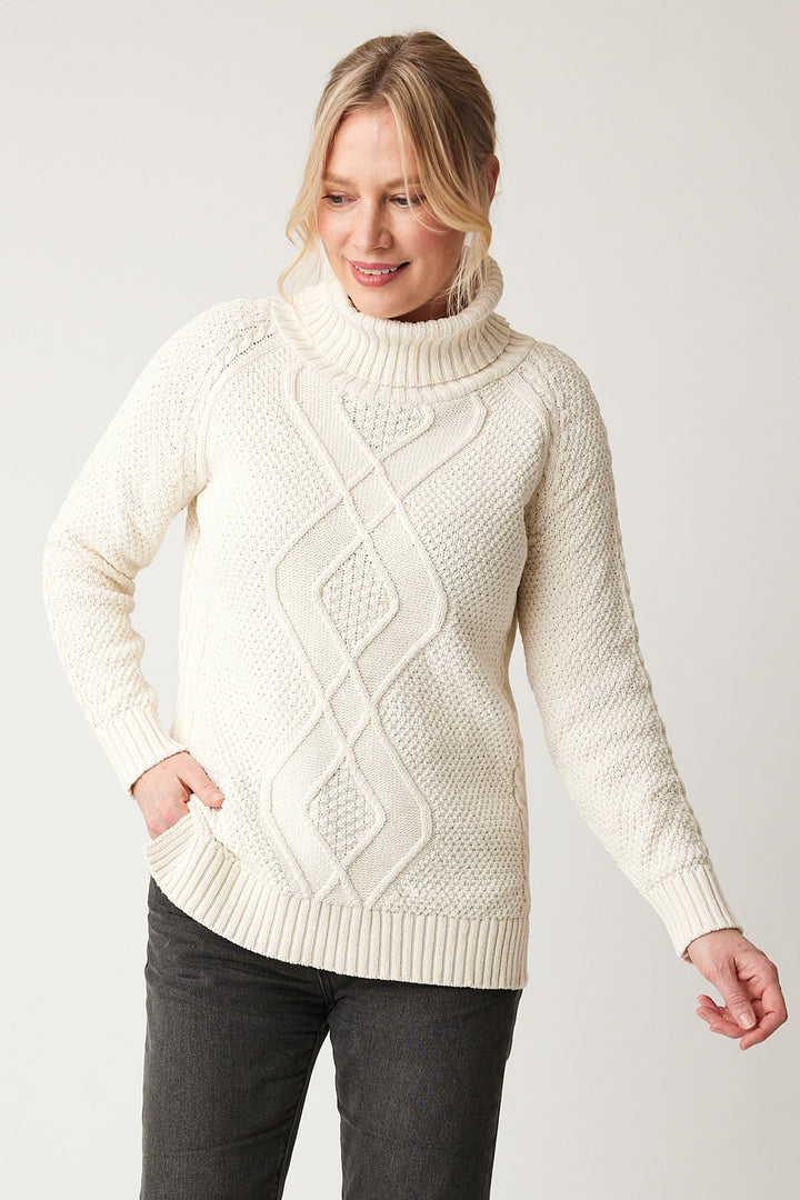 Cotton Country Fall 2024 The Dylan T-Neck Sweater offers versatile fall and winter style with its soft, cable knit design and ribbed cuffs and hem and neat turleneck. 