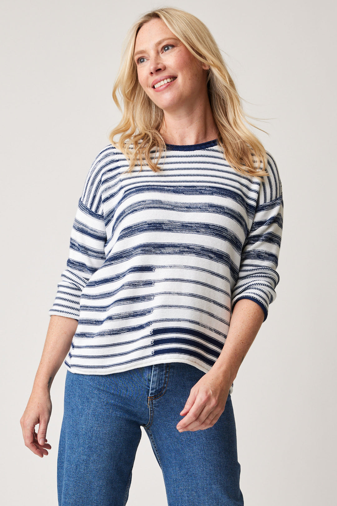 Cotton Country Spring 2024 The knit, cotton fabric is comfy and complements the round neckline and casual dropped 3/4 length shoulders.