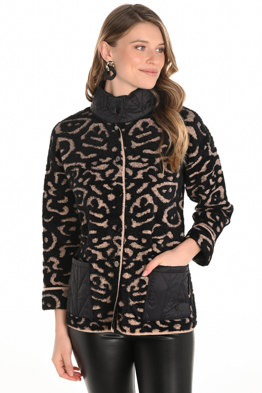 Frank Lyman Fall 2025 
Featuring a striking contrast memory collar and front pockets, it offers a stylish twist on classic tailoring. The front zipper adds convenience while maintaining a sleek silhouette.