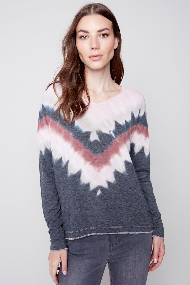 Embrace your creative side with our Tiedye Long Sleeve Top! This unique piece features a playful printed basic V-neck knit top, perfect for making a stylish fall statement. Featuring soft tones with an edge along with the drop shoulder design for an effortless yet bold look. 