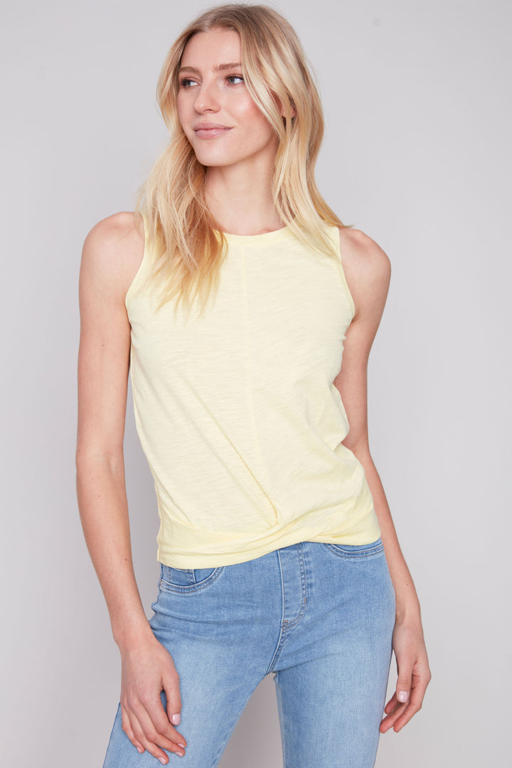 With a playful knot detail and back to basics style, this tank is perfect for keeping cool in the warmer months.