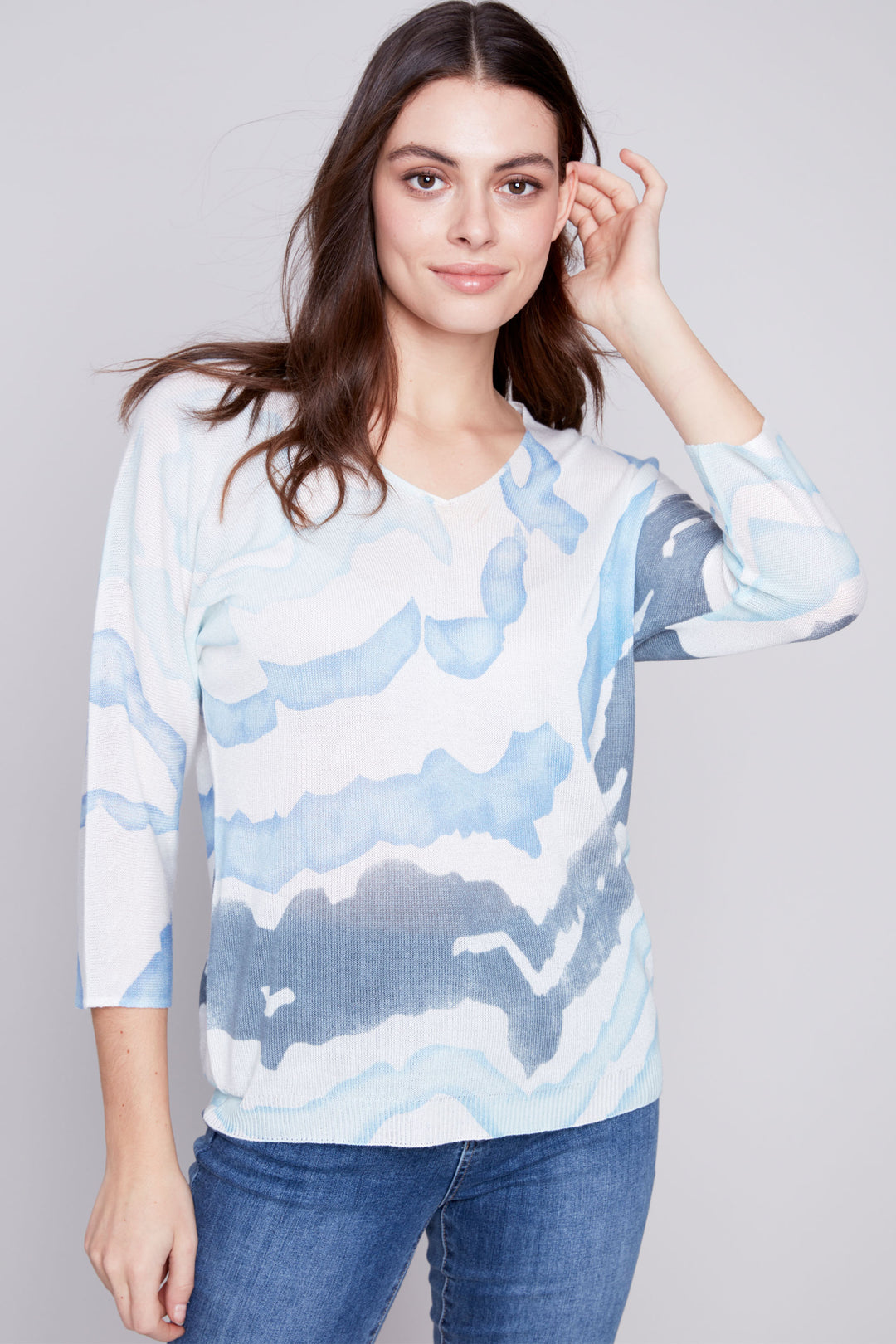 Featuring a soft cut v-neck and classic dolman sleeves, this cool watercolour print will add a playful touch to your wardrobe.