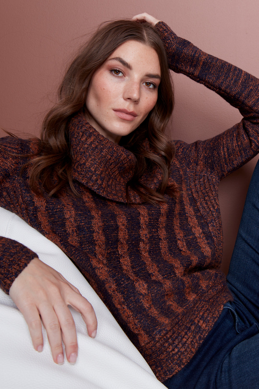 Look instantly stylish in this beautiful two-tone cable knit top. Crafted from a soft and cosy blend of yarns, this sweater features an intricate design pattern and two tones of cinnamon navy for a timeless look. Enjoy its cowl neck, standard to fitted size, and all day comfort. 
