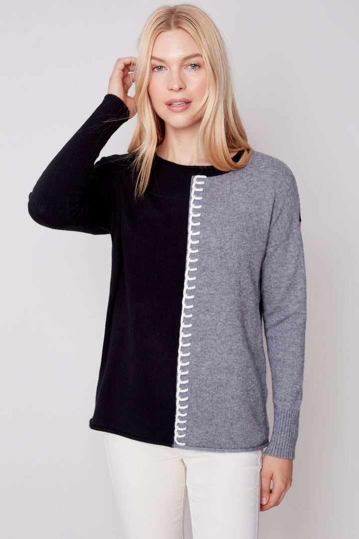 Featuring a vertical colour block design and blanket stitch detailing, this crew-neck sweater will give you something different when it comes to your daily wardrobe.