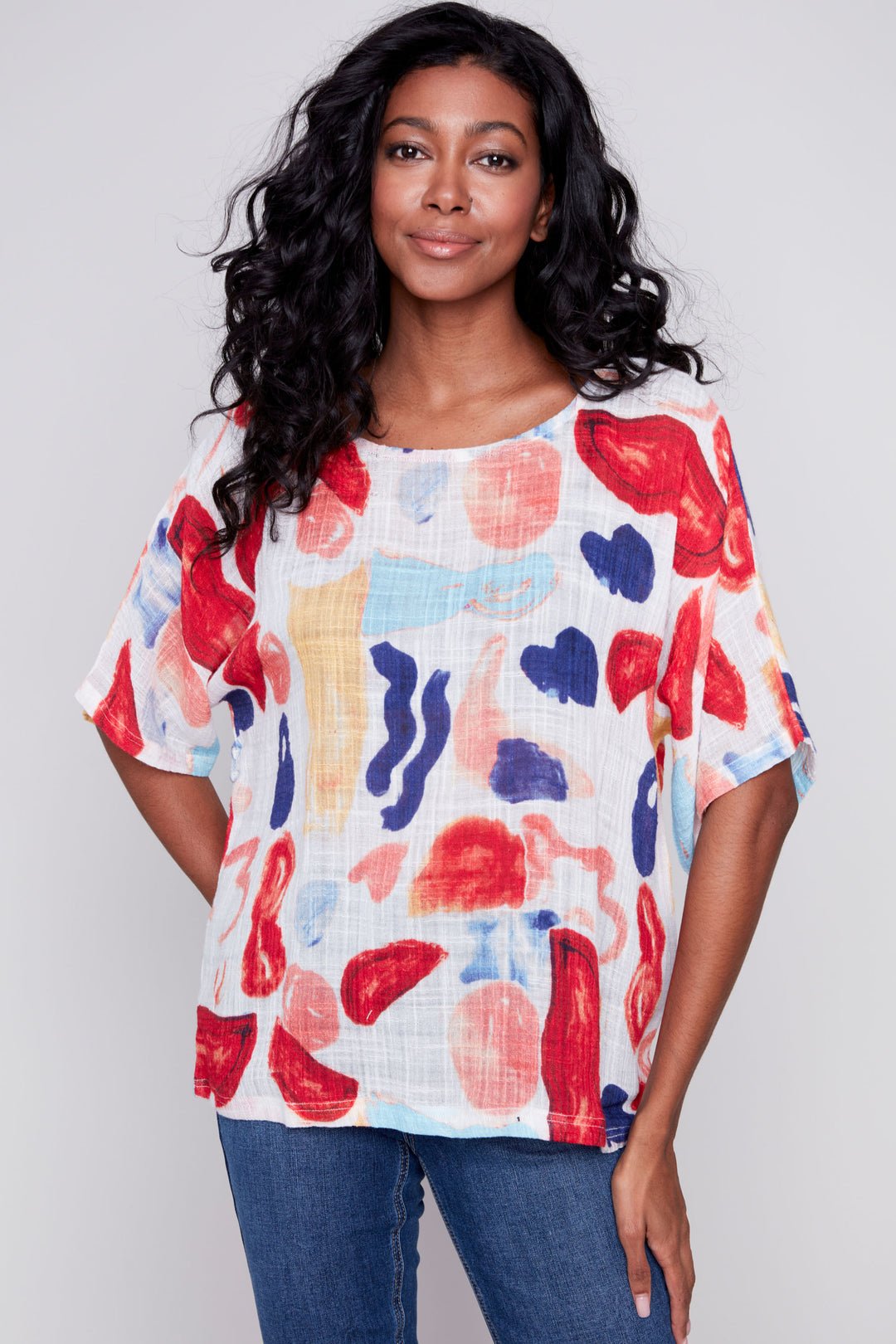 Made of soft, lightweight printed cotton gauze, this top features a neat abstract paint print all-over and trendy dolman sleeves.