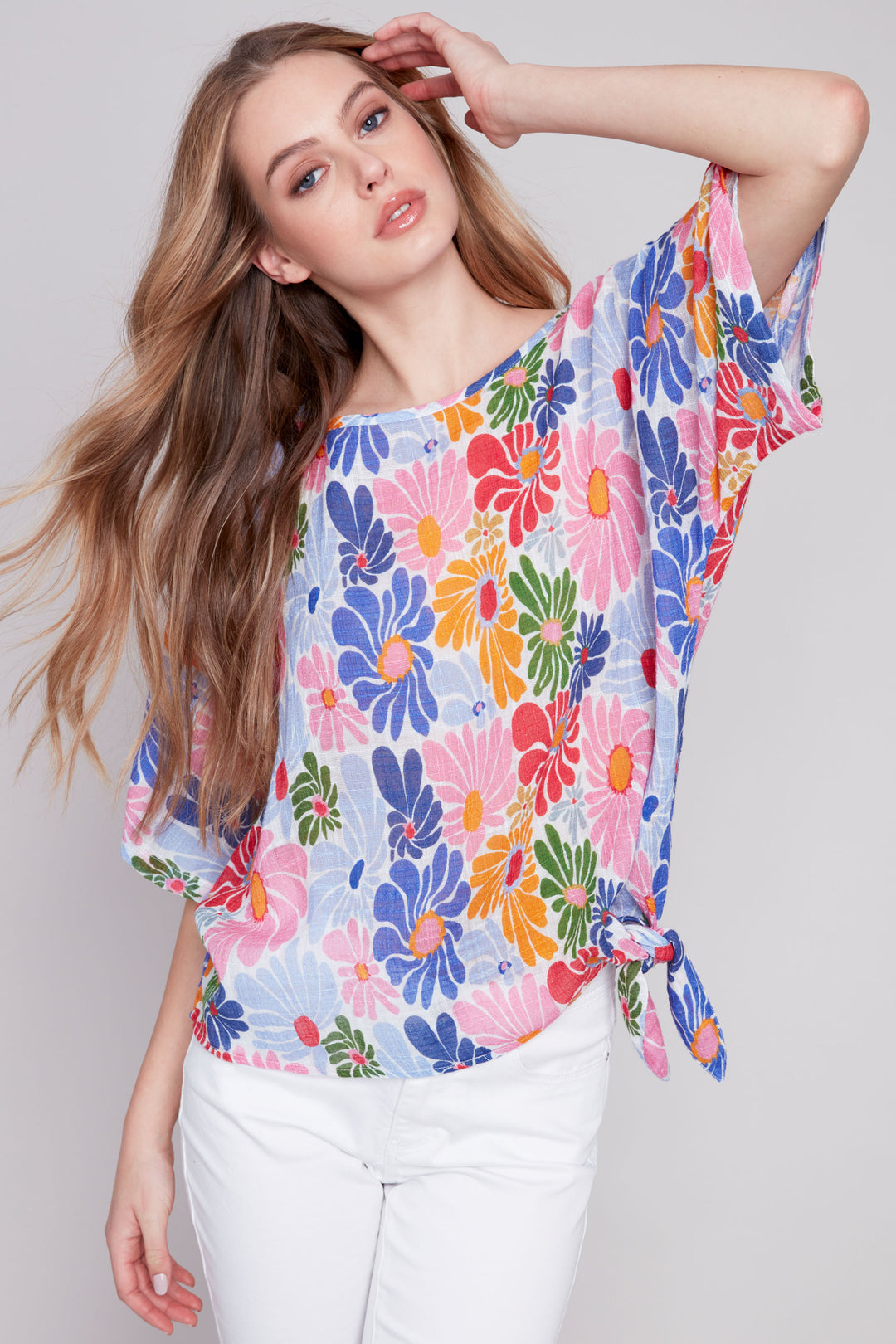 Charlie B Summer 2024 Made of soft, lightweight printed cotton gauze, this top features a neat floral print all-over and trendy dolman sleeves. 
