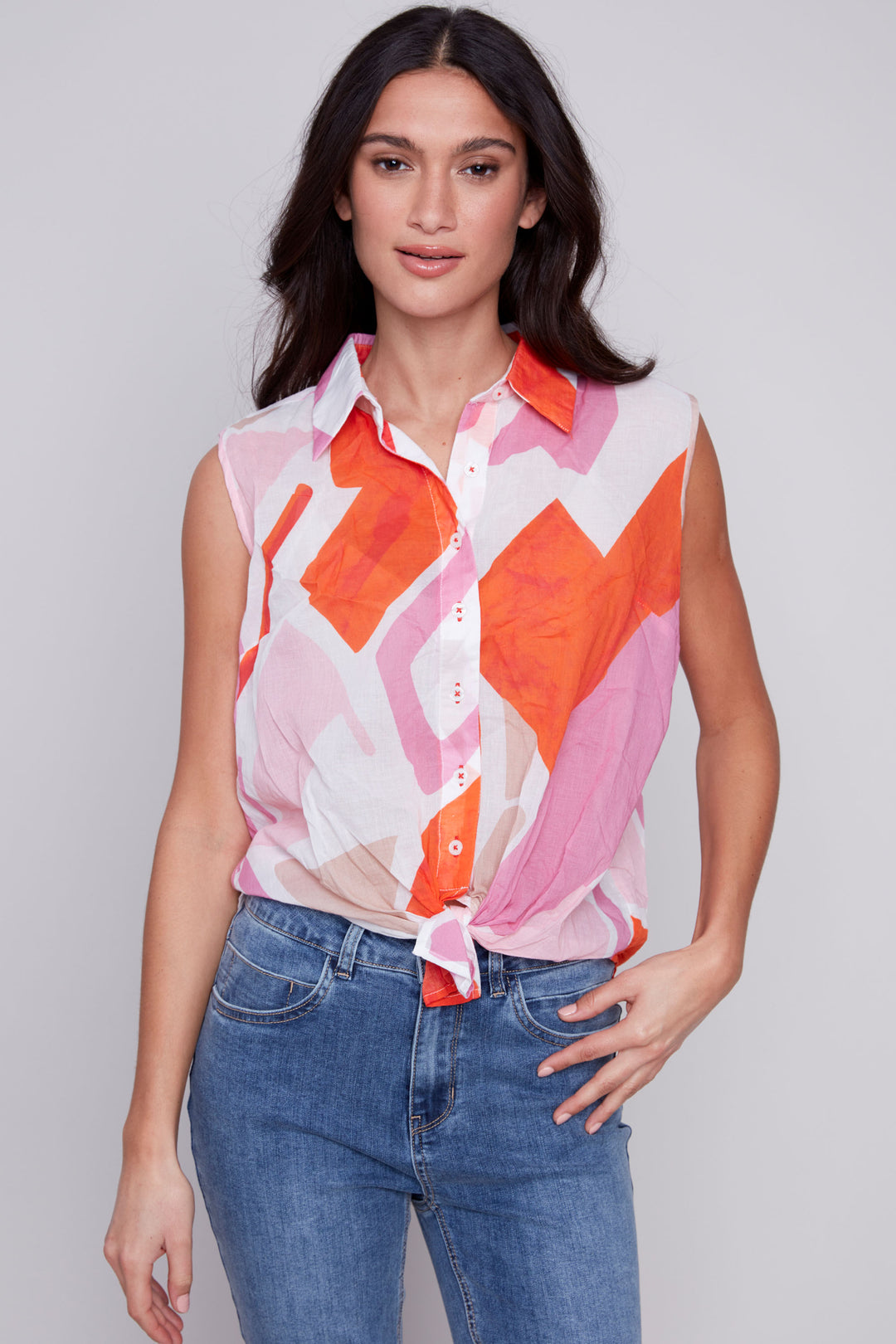 Lovely tie knot at the hem adds flair while hearts and abstract design print brings a playful touch. 
