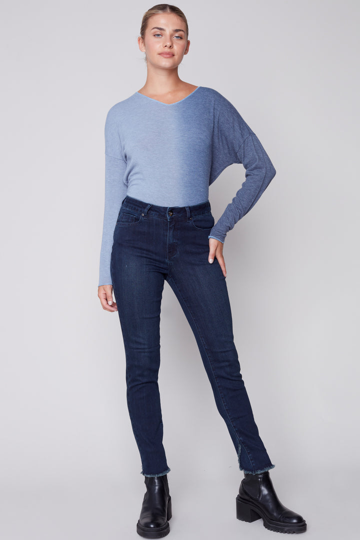 These Fringe Jeans with tulip hem will have you feeling comfortable and stylish! Crafted with a super stretchy denim and a unique tulip hem featuring a frayed, raw edge, these well-fitted ocean deep blue jeans will make a statement with