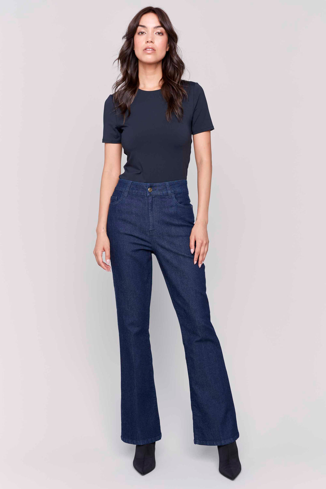 Charlie B Fall 2024  The regular rise and bootcut design offer a standard fit, while the dark denim colour and stretch denim provide comfort and versatility. 