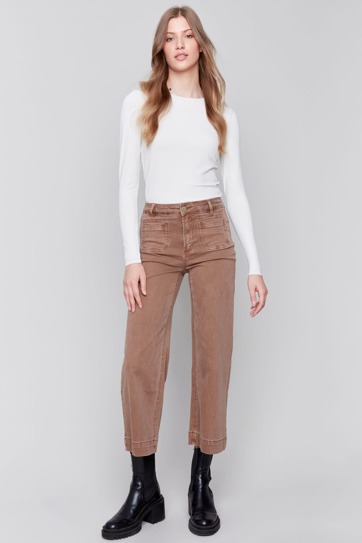 Charlie B Fall 2024  The modern flare hem design adds a stylish twist to the classic twill pant. With a regular rise and front patch pockets, these jeans are both functional and trendy. 