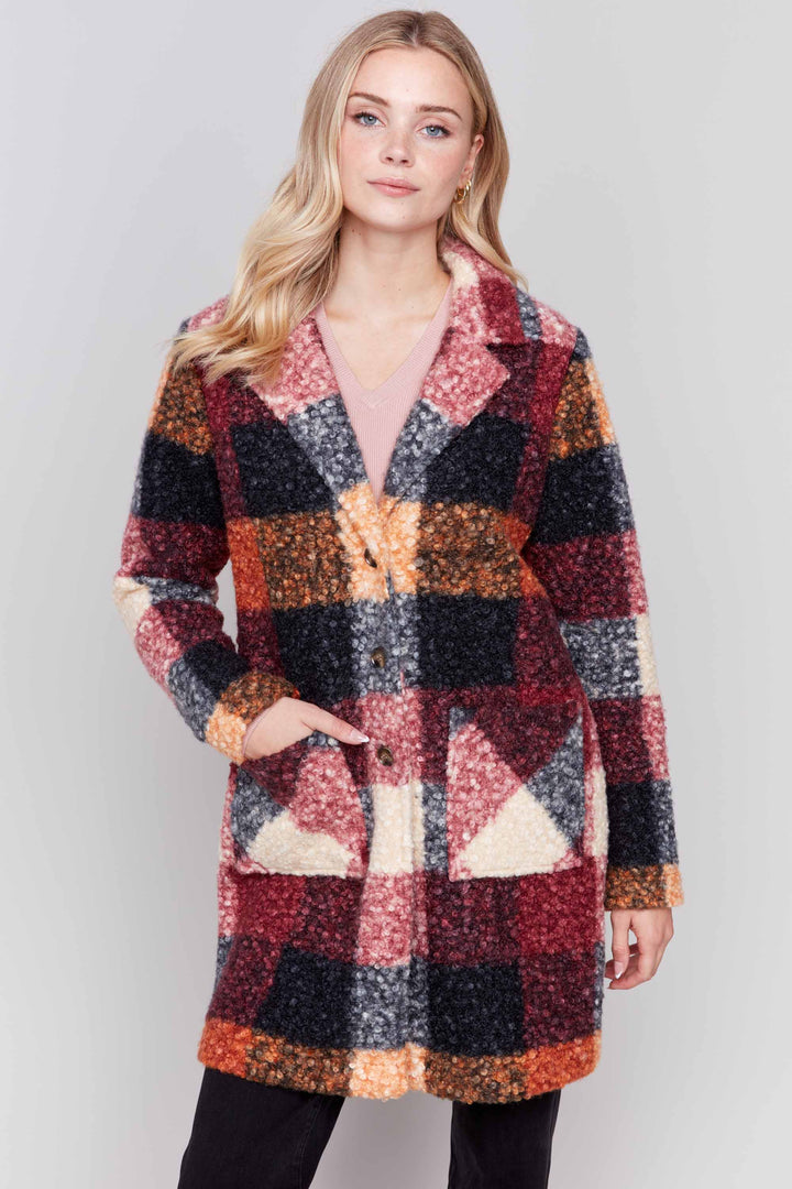 Charlie B Fall 2024 Crafted from soft, bouclé knit fabric, this straight cut coat features a plaid pattern, a button front and patch pockets for a classic, fall and winter-ready look.