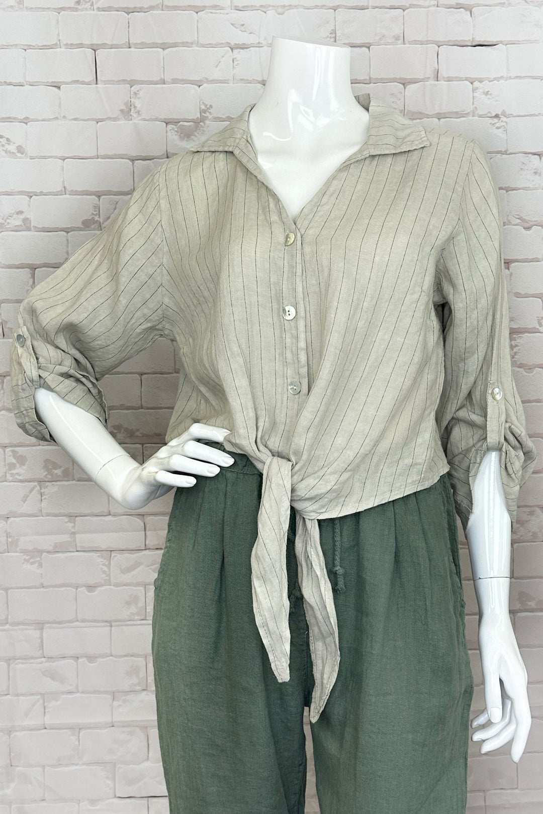 Cherishh Spring 2024 Made from soft, all-linen fabric, this classy top is perfect for any spring and summer occasion. With full front buttons and full length sleeves which are easy to roll-up for a more casual look.