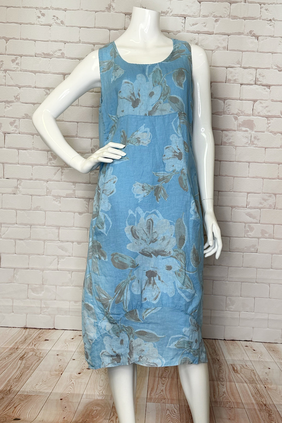 CHERISHH Spring 2024  With a round neckline and convenient front pockets, this dress is both lightweight and stylish. The subtle yet eye-catching floral print adds a touch of charm.