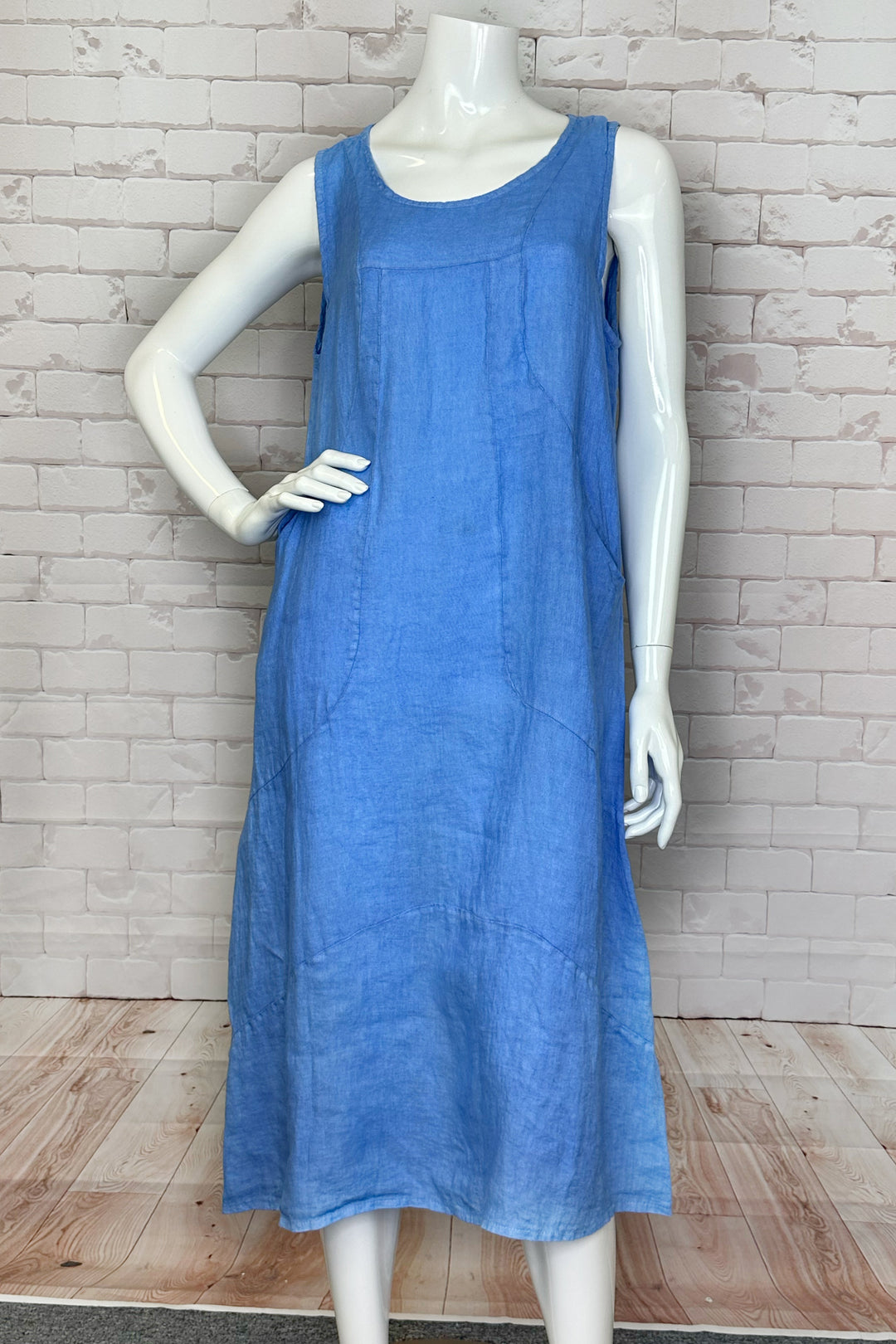 CHERISHH Spring 2024 Featuring fabulous spring colours, this linen dress will keep you looking light and right! With convenient front pockets, this simple and classic dress is a must-have in any wardrobe for the warmer months.