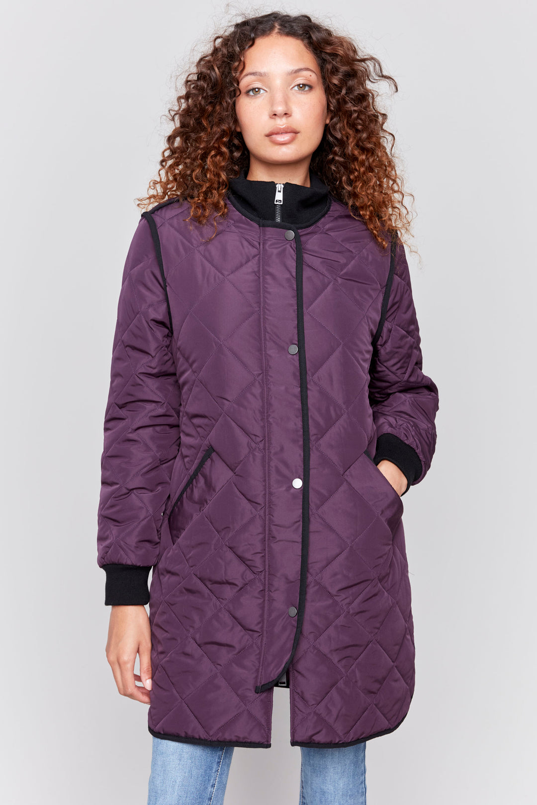 Charlie B Fall 2024 Featuring a long quilted puffer style, rib knit zipper-front closure and pockets, all in a bold, bright colour.