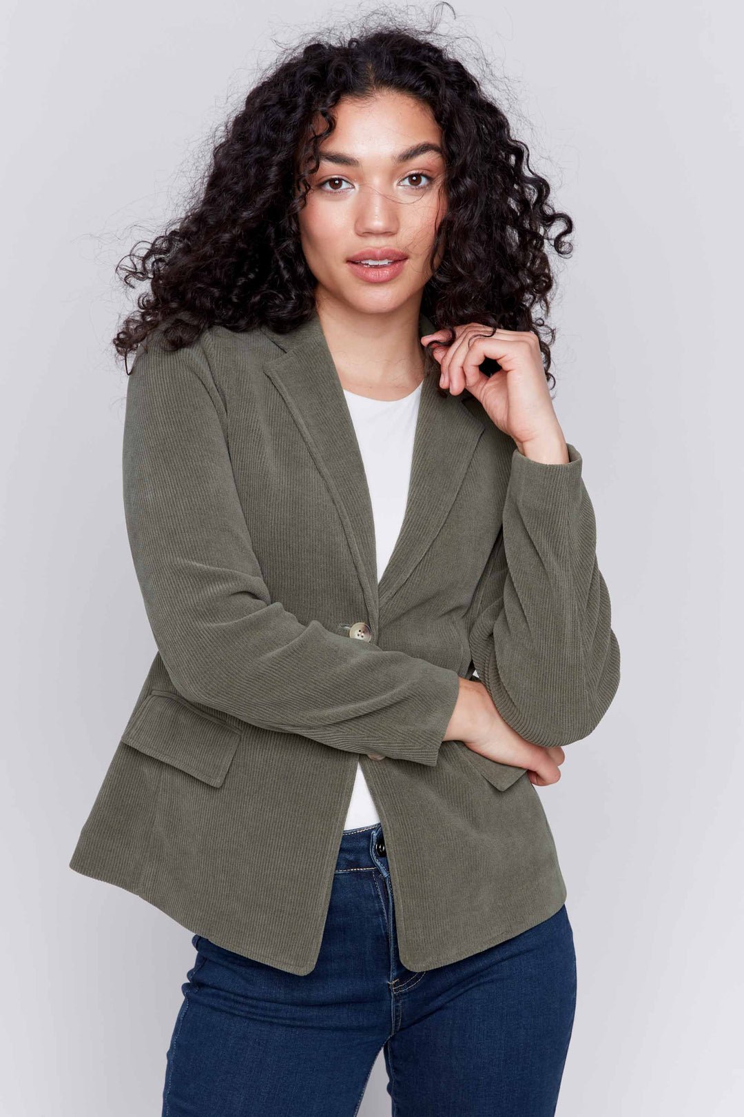 Charlie B Fall 2024  With a unique and elegant design, this blazer will elevate any outfit. The two button closure adds a touch of casualness to the classic flat collar and ribbed design pattern. 