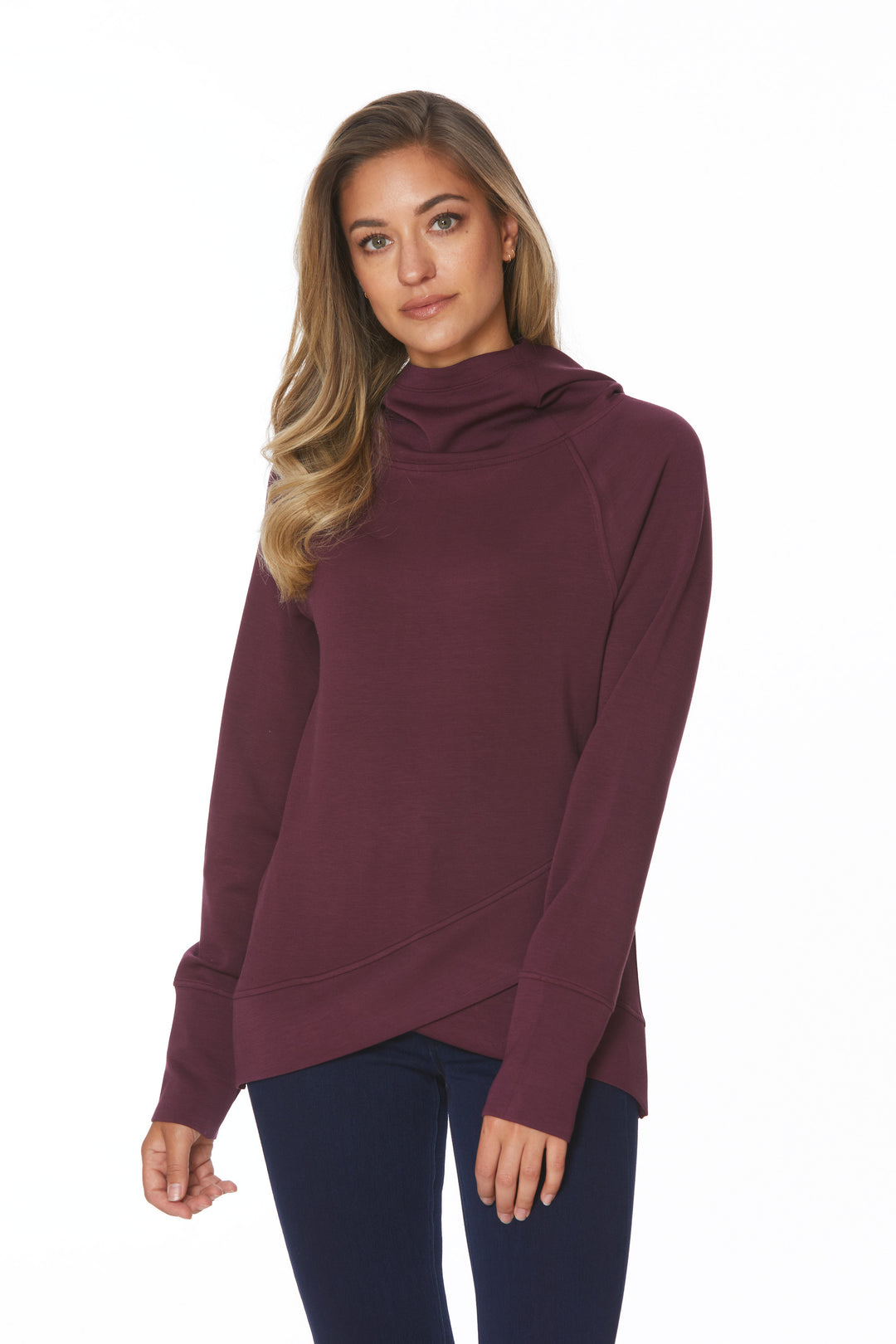 Melissa Paige Fall 2024  With tunic length and a high neck cowl collar with hood, it's perfect for any occasion. The star of the show is the layered tulip hem, while the cuffs have thumbholes for added comfort. 