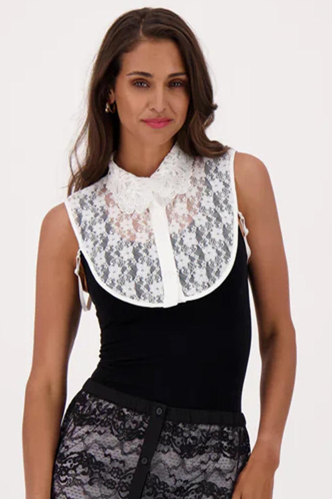 This accessory is crafted with lovely lace and adjustable straps, making it a great addition to your wardrobe.