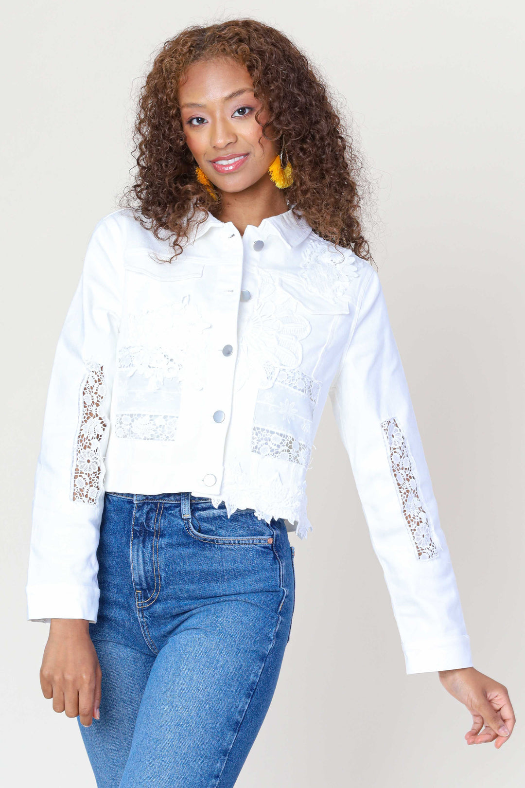 Fashion Concepts Summer 2024 This Jean Jacket With Lace features a beautiful floral doily design throughout, adding a unique touch to the classic collar and full front button design.