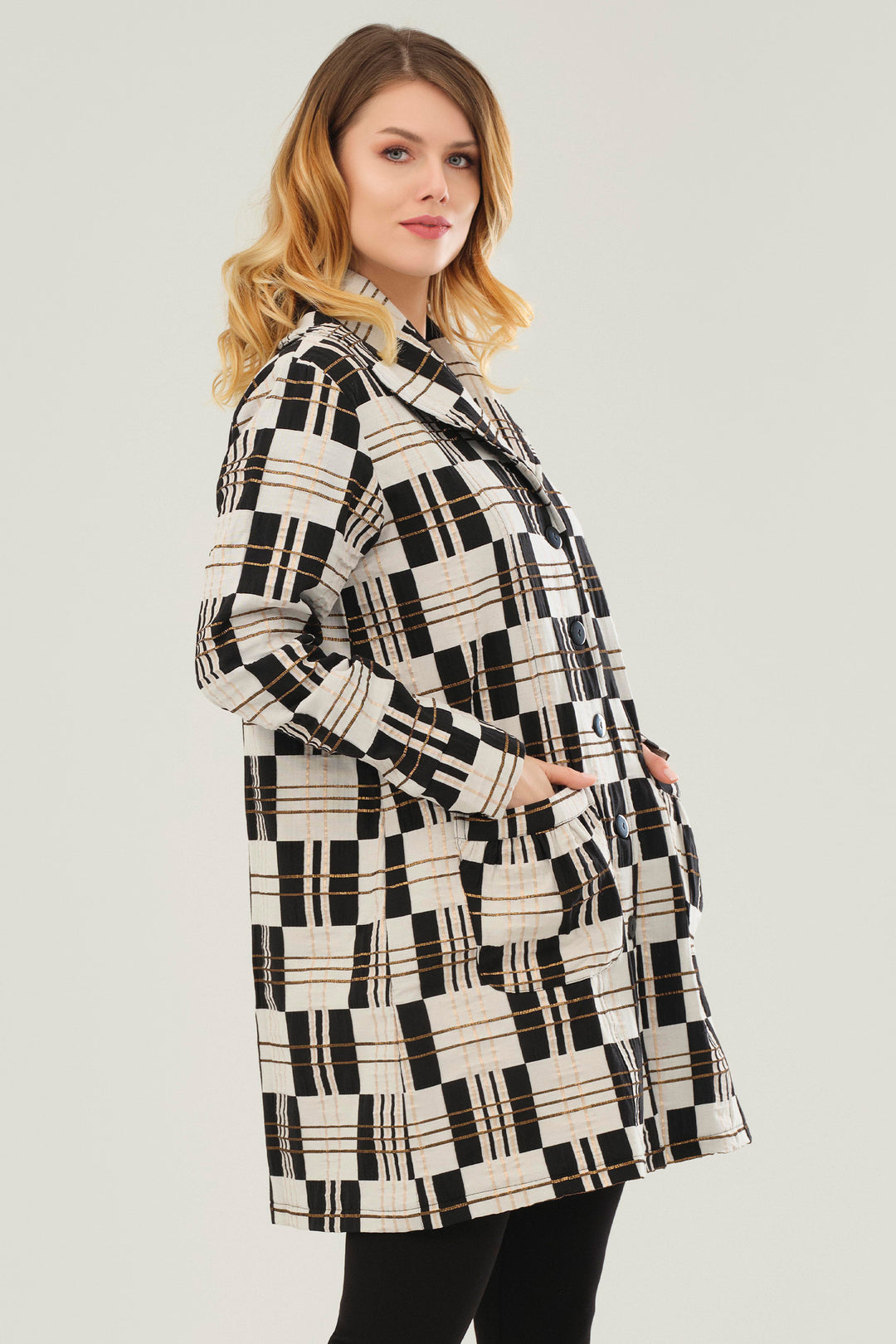 This eye-catching woven light jacket features a soft v-neck collar, front buttons, two front elastic pockets and an elastic bubble hem, all above the knees length. 