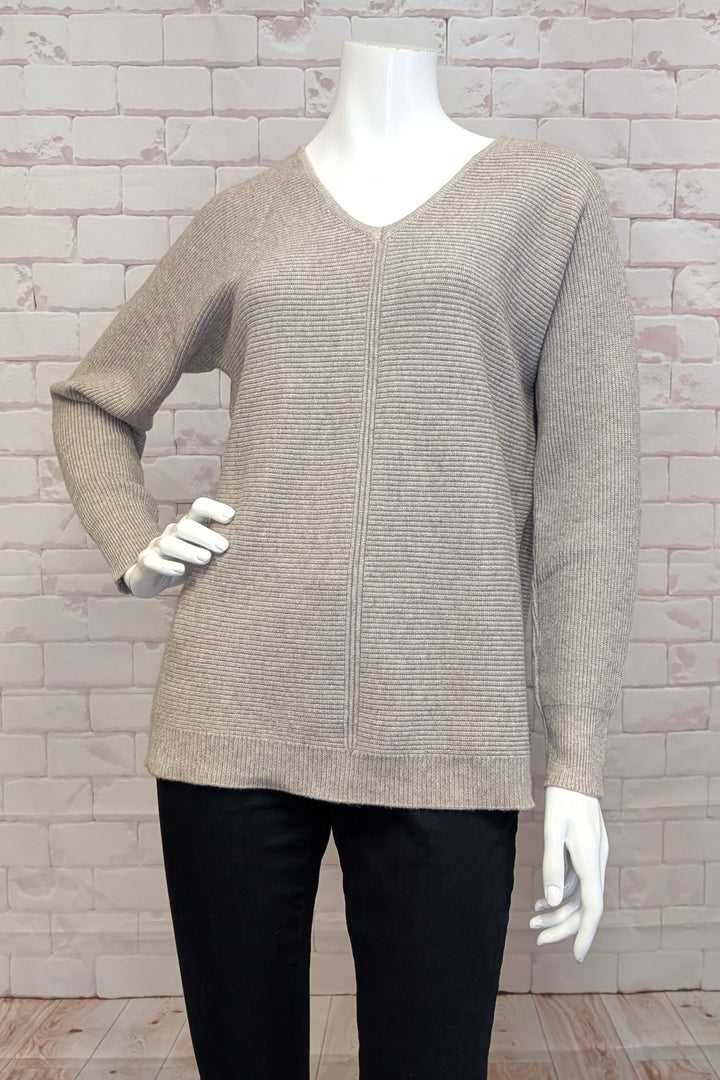 Etern Fall 2025 
This Ottoman Rib V-Neck Sweater Top combines a soft cut V-neck with a textured ribbed knit design for a refined look. Its neat center contrast ribbing adds subtle detail, making it both cozy and polished. 