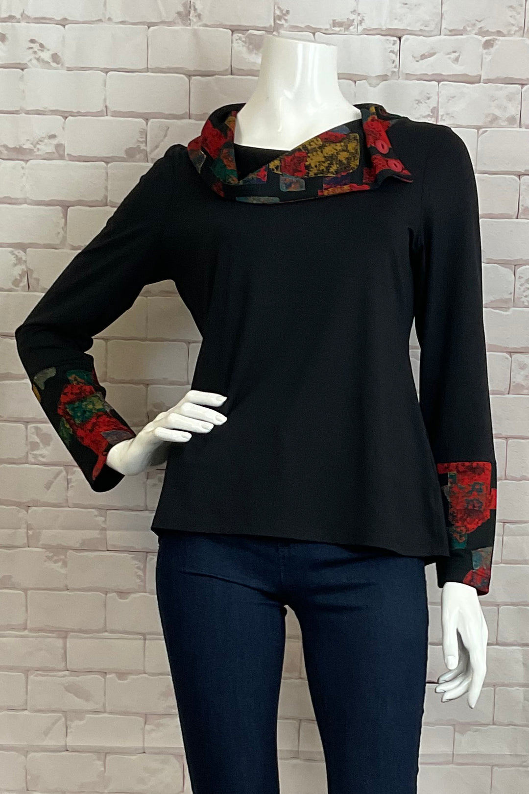 Michael Tyler Fall 2024  Its super light, thin and flowing fabric provides breathability and comfort. The contrast cuffs feature a lovely print that adds a touch of elegance. 