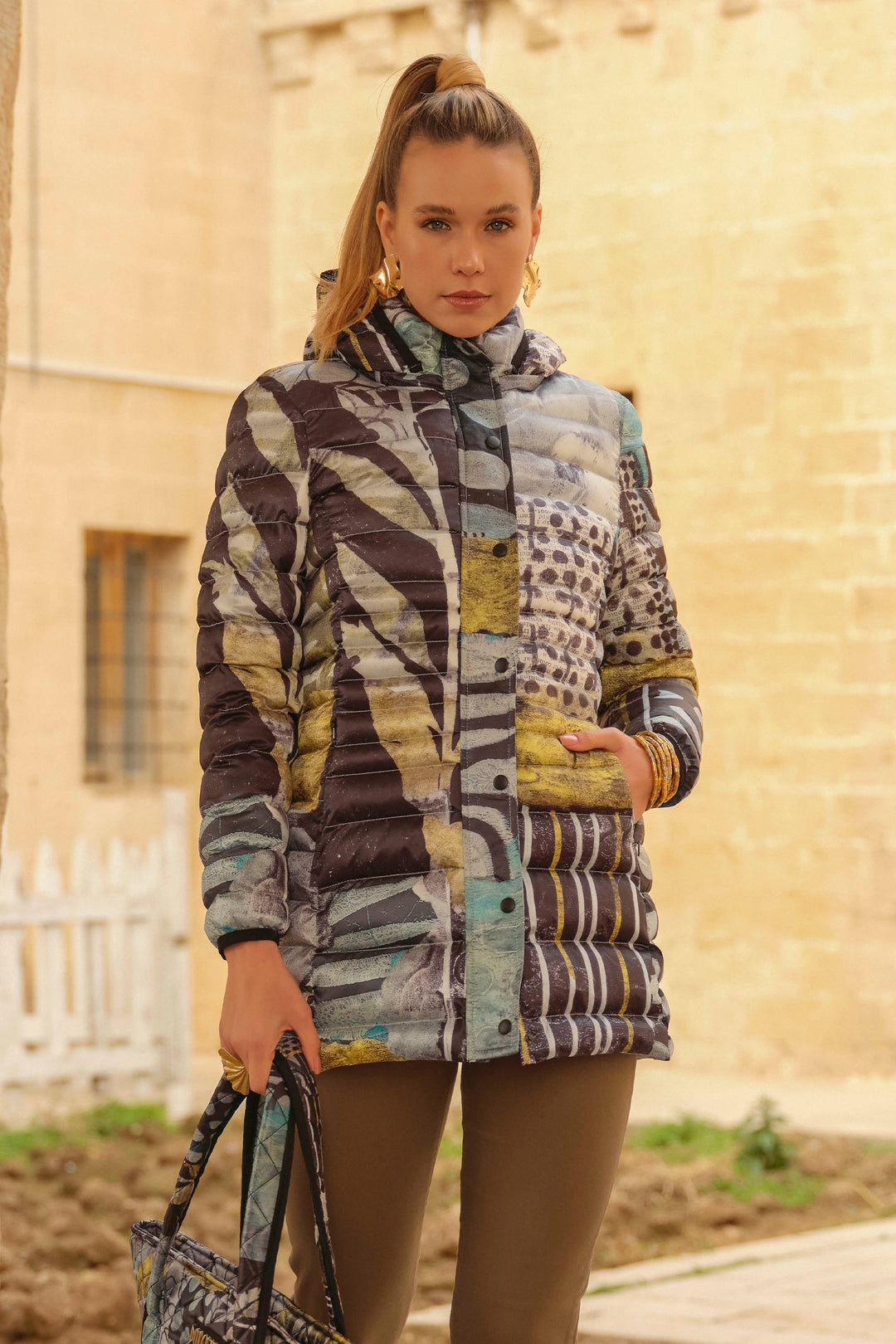 Dolcezza Fall 2024  Its all-over abstract print design and lightly padded fabric keep you fashionable and insulated on chilly fall and winter days. 